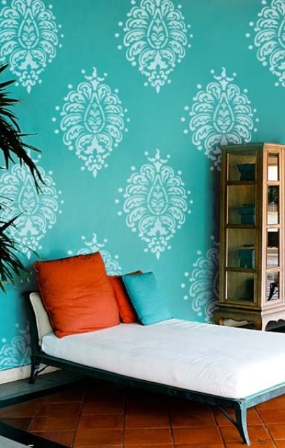 turquoise and white printed wallpaper is a great idea for an accent wall in the room, it will add both color and print to the space