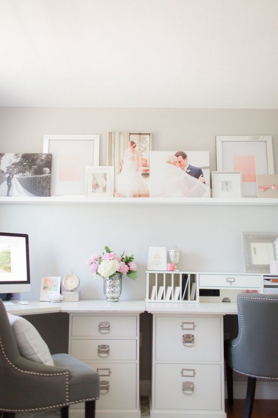 an elegant shared home office with a ledge taking the whole wall over the desks to display artworks and photos is a nice idea to cozy up your working room