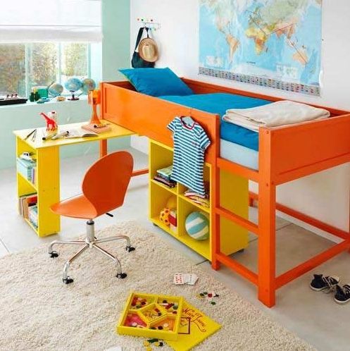 Bright orange IKEA Kura bed hack with a desk