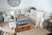 couple of off-white IKEA  sofas for a rustic living room