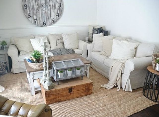 Couple of off white IKEA  sofas for a rustic living room