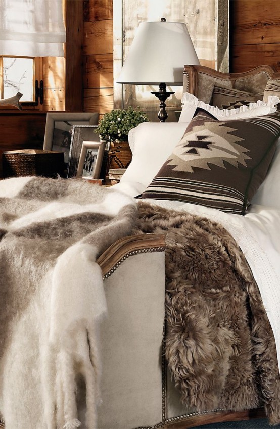 lots of faux fur and knit pillows will cozy up your bedroom and make it winter-ready at once