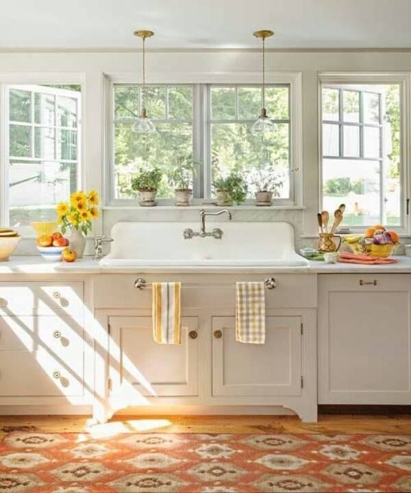 A beautiful farmhouse sink with a retro faucet could become your kitchen's focal point.