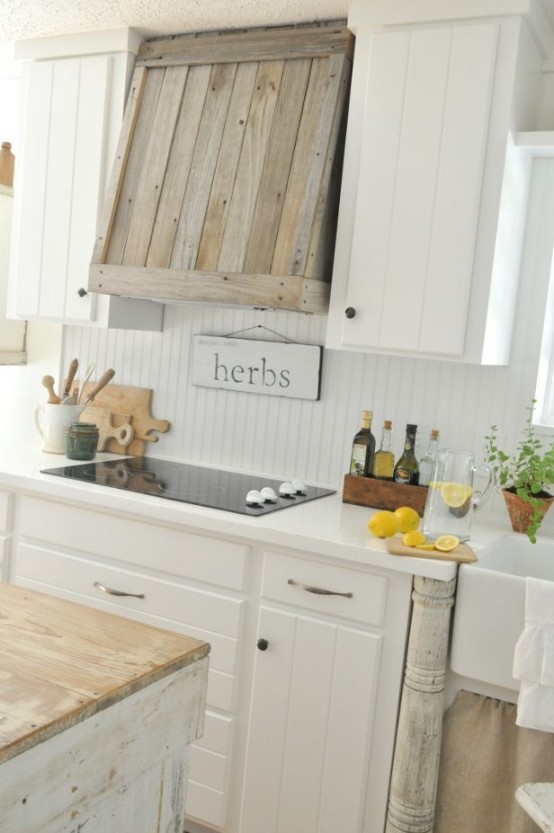 Building a cover for your modern cooking hood from wood scraps would totally work for farmhouse kitchen decor.