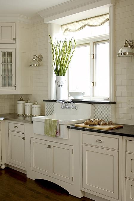 Placing  a sink near a window is a great way to highlight its design.