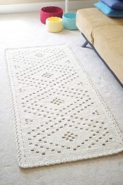 a crochet rug is a cool and lovely accessory you can DIY to personalize your space – add color and pattern to it