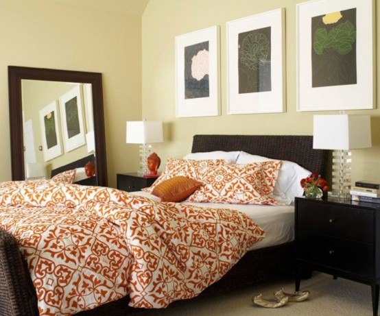 black, chocolate brown and touches of orange make this bedroom really fall-like