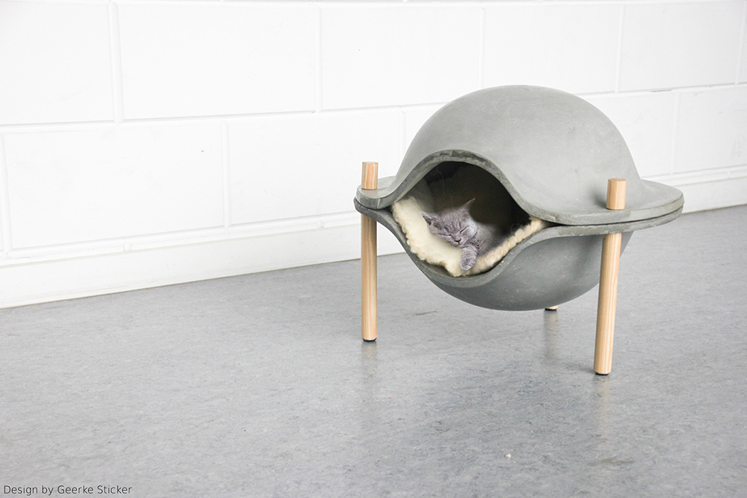 Cozy and stylish concrete pet home on wooden legs  1