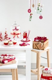 red and white Christmas decorations, hanging ornaments, gift boxes will make your kitchen feel like holidays