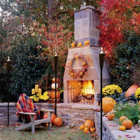 If you patio features a fireplace you can use it as a base for all your outdoor Fall decor.