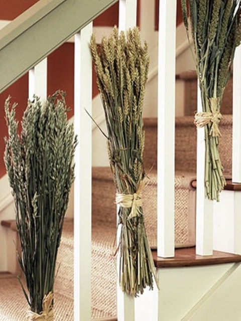 Attach a bunch of long wheat stems to balusters using twine and you're good to go.