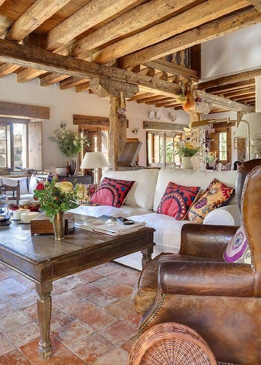 Cozy living room designs with exposed wooden beams  15