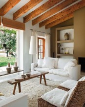 cozy-living-room-designs-with-exposed-wooden-beams-33