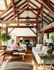cozy-living-room-designs-with-exposed-wooden-beams-35