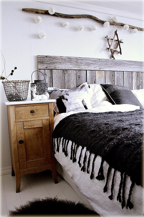 Weathered wood planks are a perfect materials for DIY rustic decor pieces, like headboards.