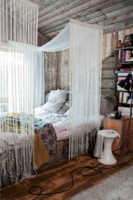 Weathered wood is great but throwing a delicate canopy could make a rom more boho and chic.
