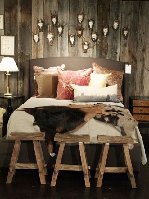 If you're going with a dark color scheme make sure to  bring in plenty of lighting. A bedding set in a light color would provide an interesting contrast.