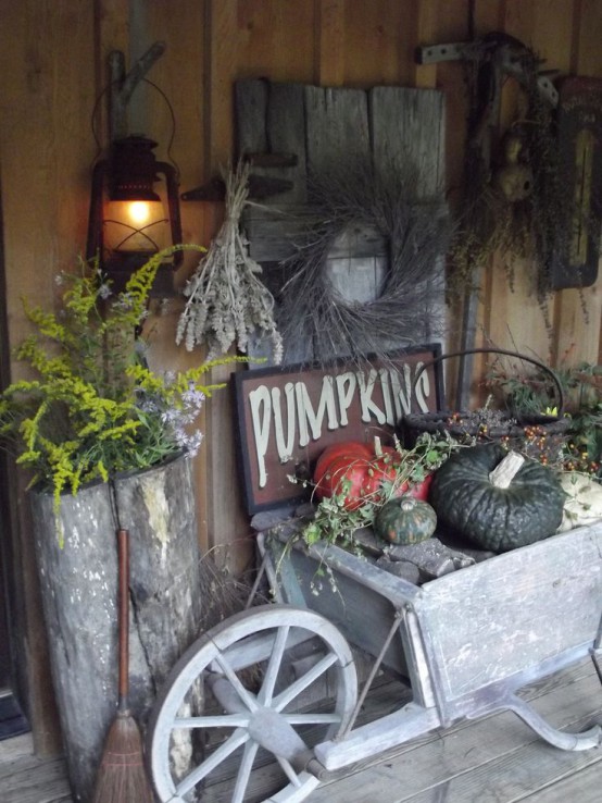 Distressed doors and harvesting tools are great things to use in your fall and Thanksgiving arrangements. What can be more meaningful than such vintage stuff?