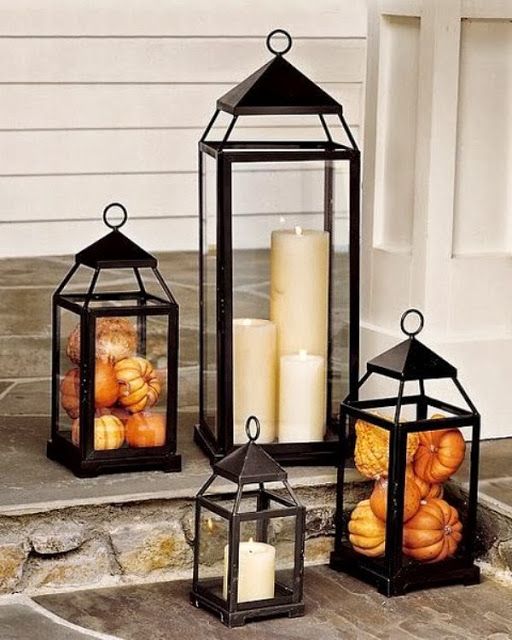 Lanterns are great fall decorations. You can use them with candles but you can also stuff them with mini pumpkins.