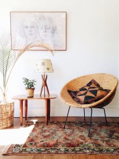 a round wicker chair, a wicker basket that hides the planter for adding a rustic feel to the space and making it cooler and bolder