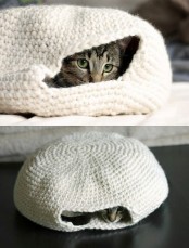 a crochet cave-like cat bed can be DIYed or bought, it’s an easy spot to hide from everyone