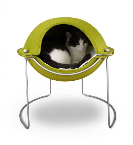 a  neon pod on metal legs is not just a bed, it's a retreat to hide inside, it's bright and cool