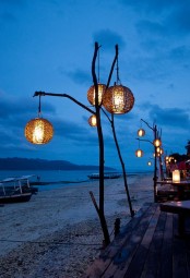 creative outdoor lamps of branches and woven lampshades on rope are amazing for seaside and coastal outdoor spaces