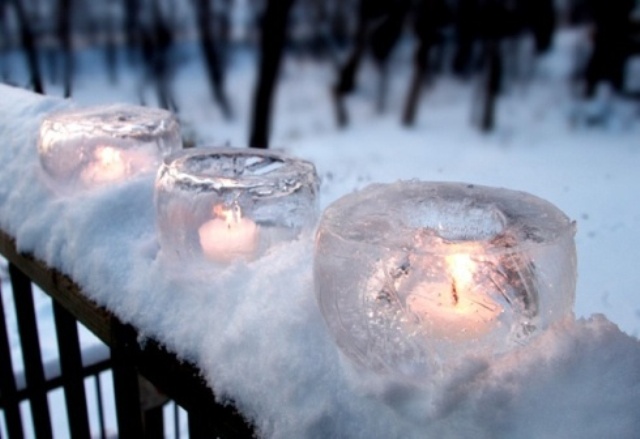 Glass shaped ice candleholders are easy to make yourself and they can placed anywhere you like to add a amgical touch to the space