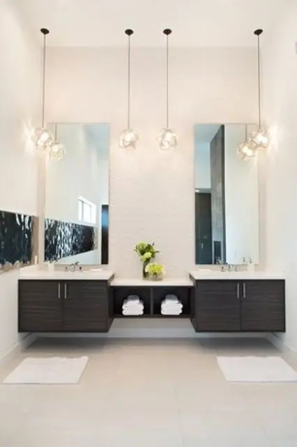 3D pendant lamps over the vanity are a cool idea that will bring an edgy feel to the space