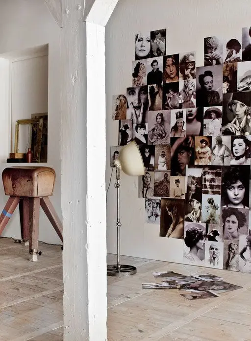 a heart-shaped black and white photo display right on the wall is a creative and cool decor idea