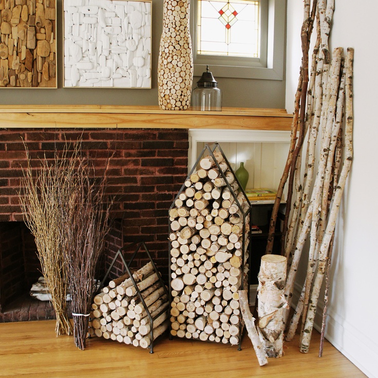 Firewood and branch storage units shaped as little houses are cool and cozy to add a bit of rustic feel to the space