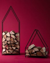 laconic metal firewood stands shaped as houses are a cool and bold idea with a cozy feel