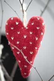 a red knit heart with tiny white hearts as a print is a very cute and really heart-warming Christmas ornament