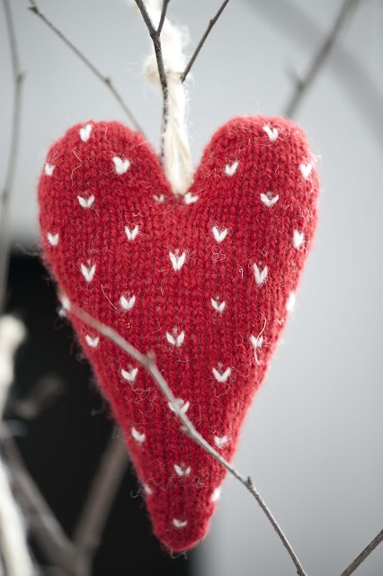 A red knit heart with tiny white hearts as a print is a very cute and really heart warming Christmas ornament