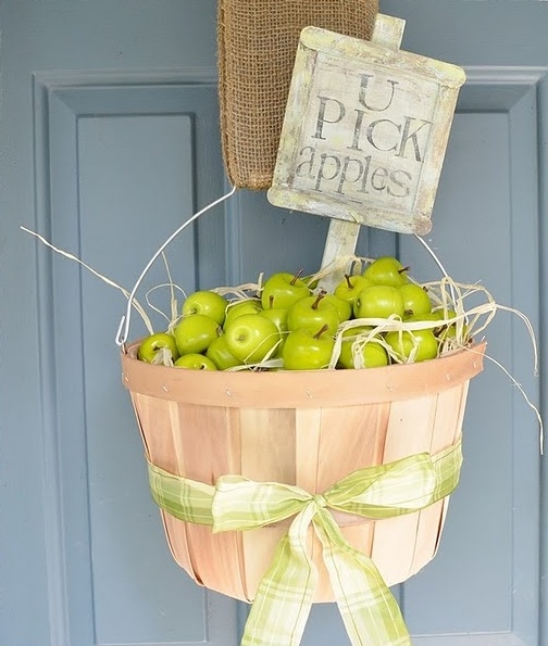 If you're into wreaths you can put some apples in a bucket and hang it on your door instead.
