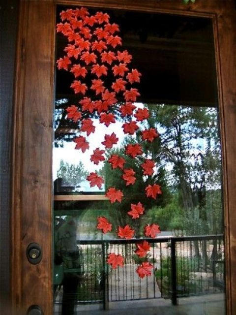 Glue some faux leaves on a glass or wood door.