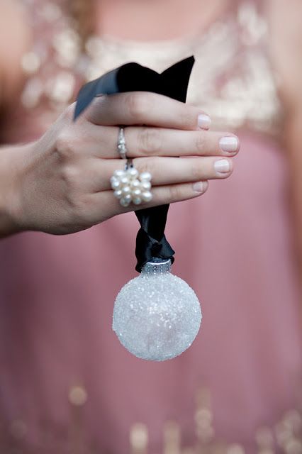 a mini snowball Christmas ornament on a black silk ribbon will be great for your tree or to accent some wrapped Christmas gifts