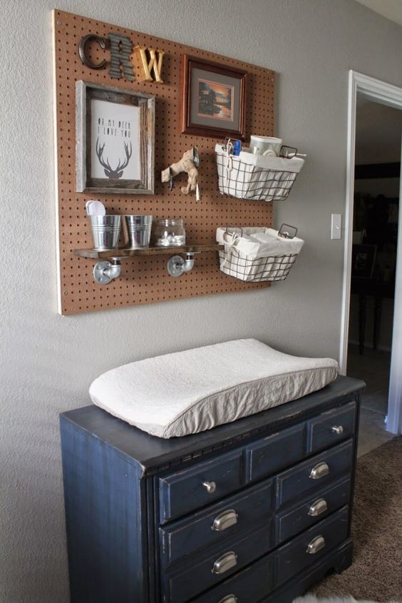 a pegboard with wire and fabric baskets plus some small buckets will meet all your needs on storage