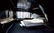 Dark Futuristic Hotel Style Bedroom