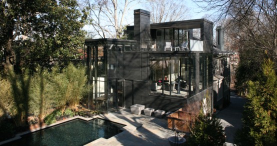 Contemporary Dark Glass House with City Skyline Views