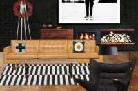 dark modern living room with black and white rug