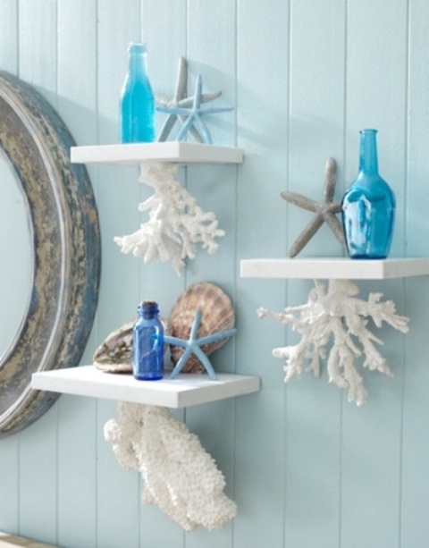 bathroom shelves with corals attached to the bottom of each piece is a lovely idea for a seaside or coastal bathroom