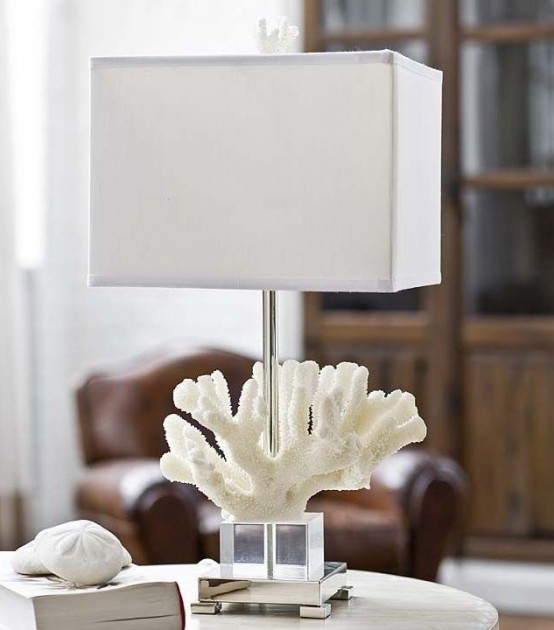 a lovely seaside table lamp with a coral at the base and a neutral lampshade is a lovely idea to rock for a coastal space
