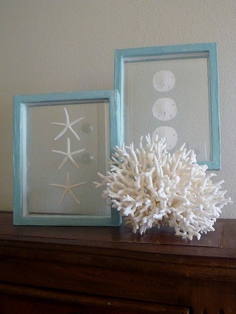 Corals and seashells and starfish artworks on the mantel make it feel beach like and cool