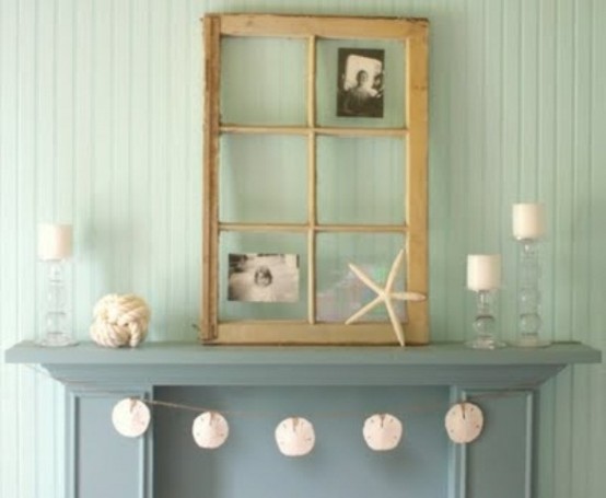 a seashell garland, candles, starfish and seashells, a rope ball will make your mantel look very beach-like