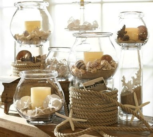 Jars with beach sand, starfish, seashells and candles, rope covered jars and rope will make the mantel look beach like and cozy