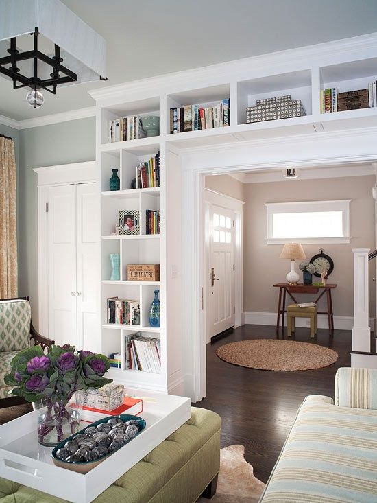 A doorway with built in shelves is a cool idea to store books and various decor, display them at their best and not to sacrifice any floor space