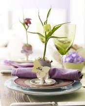 pastel dyed eggs with spring blooms inside are great to mark each place setting at an Easter party