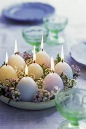 Egg Shaped Candles On Table