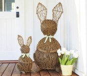 funny vine bunnies and potted white tulips are a fun and whimsy idea for Easter decor